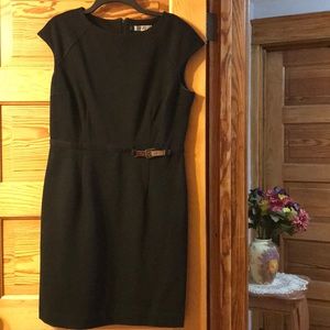 Mid length, short sleeved dress.
